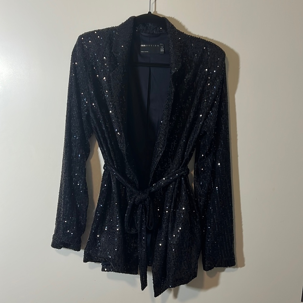 Sequin jacket with belt.